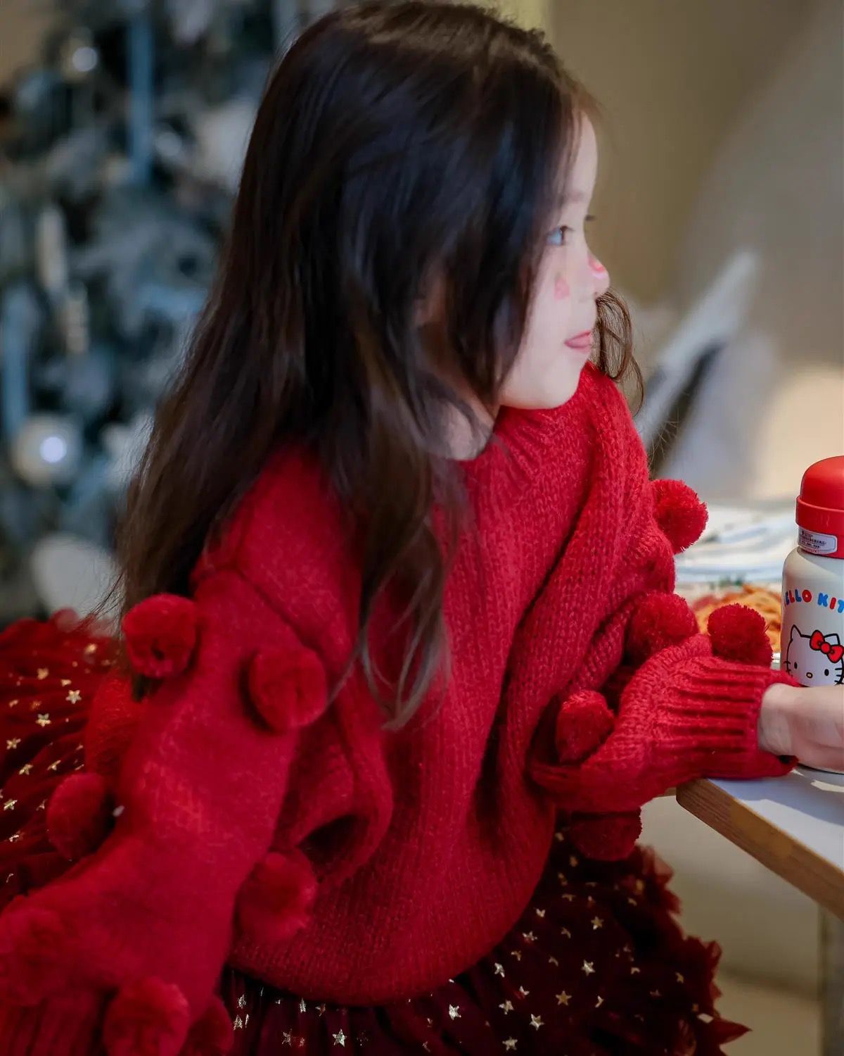 Cute red sweater with Pom poms