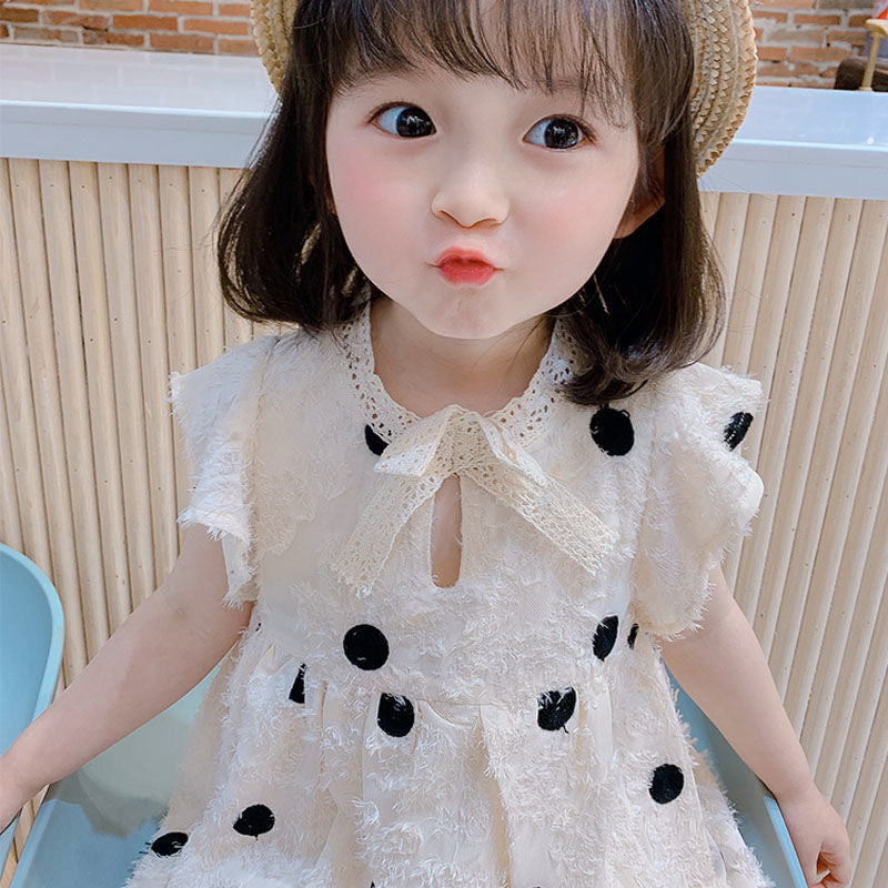 Polka dots dress with bow