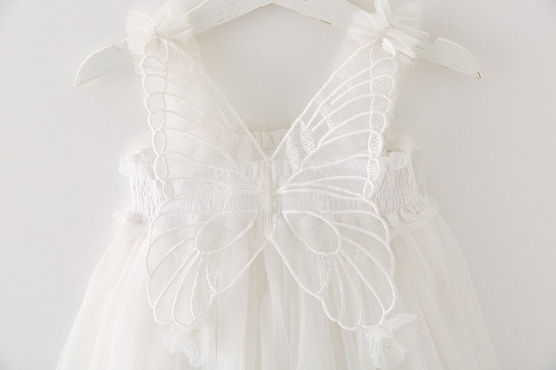 Multi layered Tutu dress with big butterfly at back and flowers