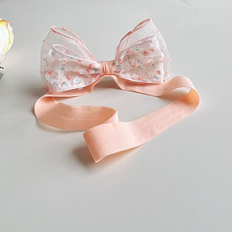 عصابة رأس مع فيونكة زهرية