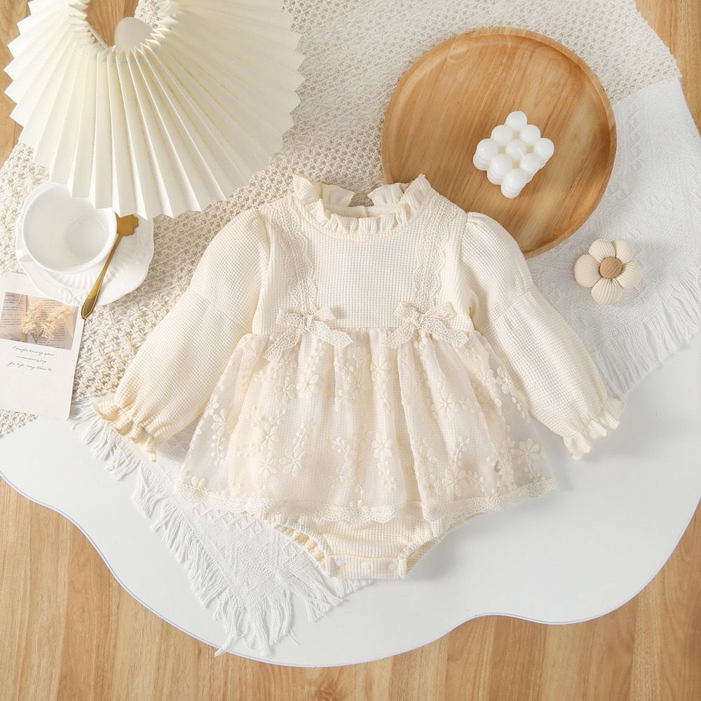 beige long sleeve romper with 2 bow knot