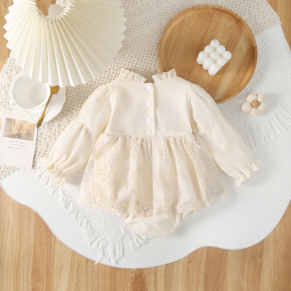 beige long sleeve romper with 2 bow knot