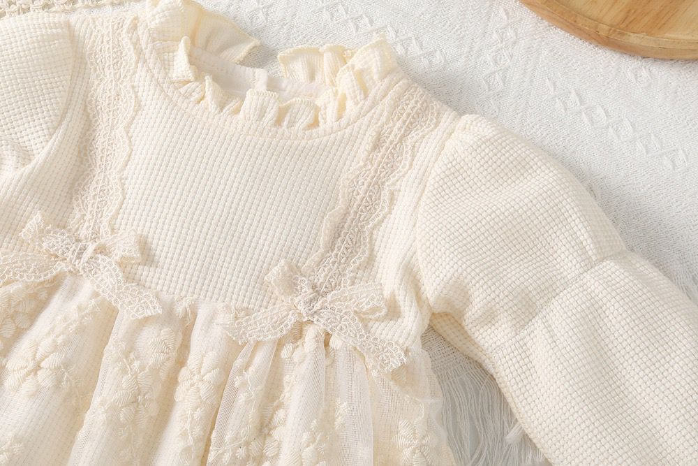 beige long sleeve romper with 2 bow knot