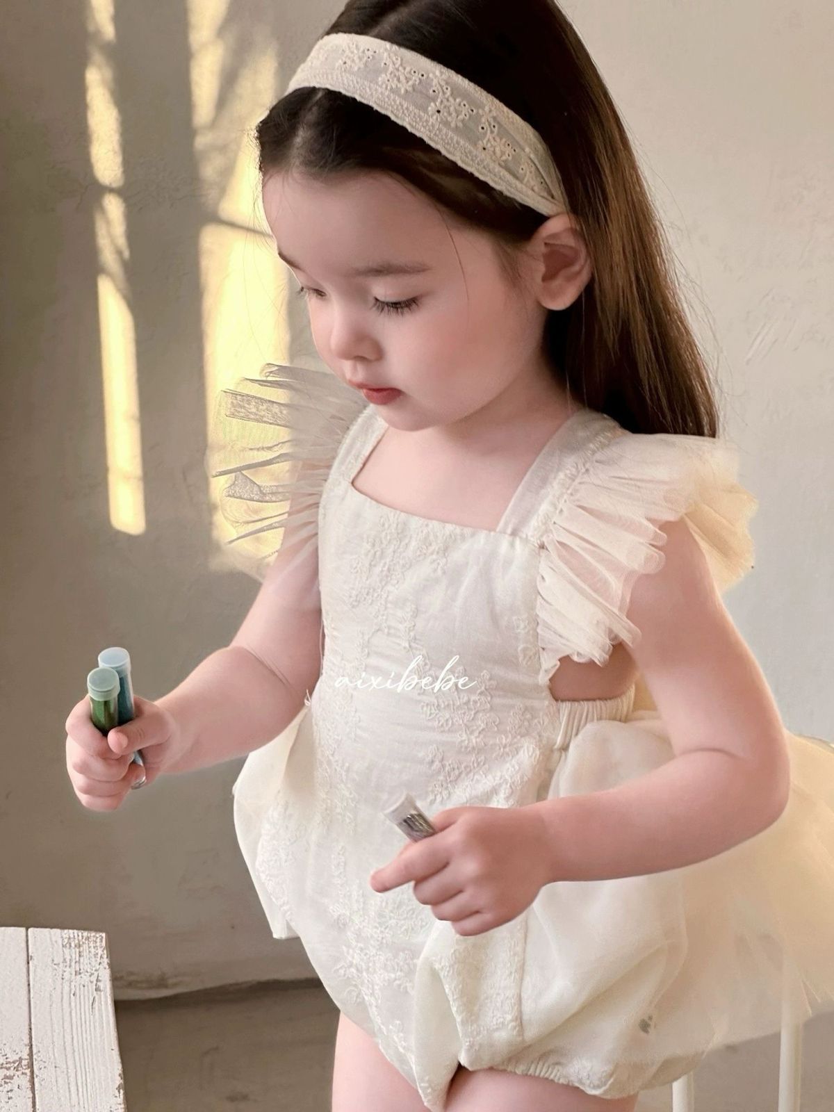 Sweet romper dress with flying sleeves beige color