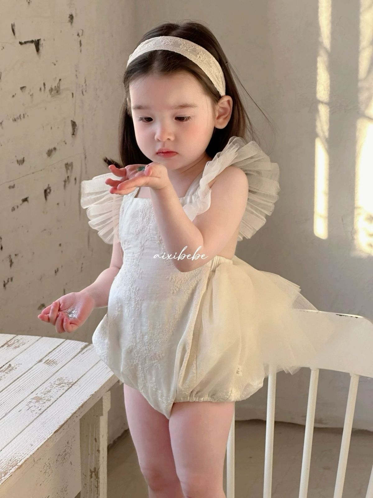 Sweet romper dress with flying sleeves beige color