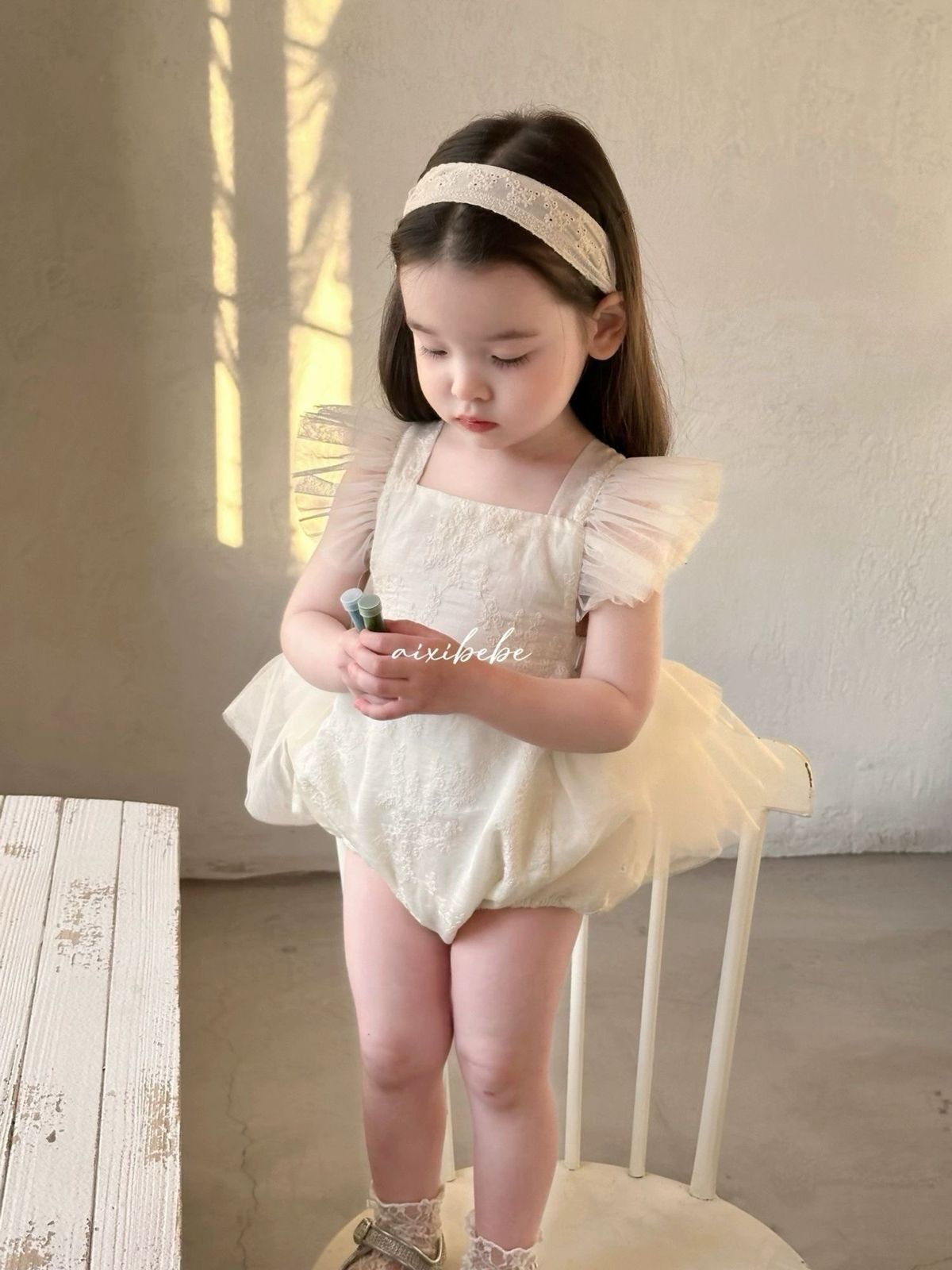 Sweet romper dress with flying sleeves beige color