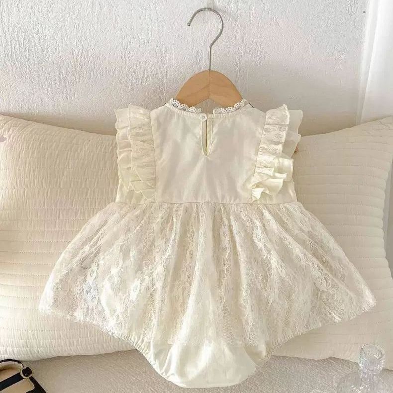 Beige baby sleeveless romper dress with black ribbon bow