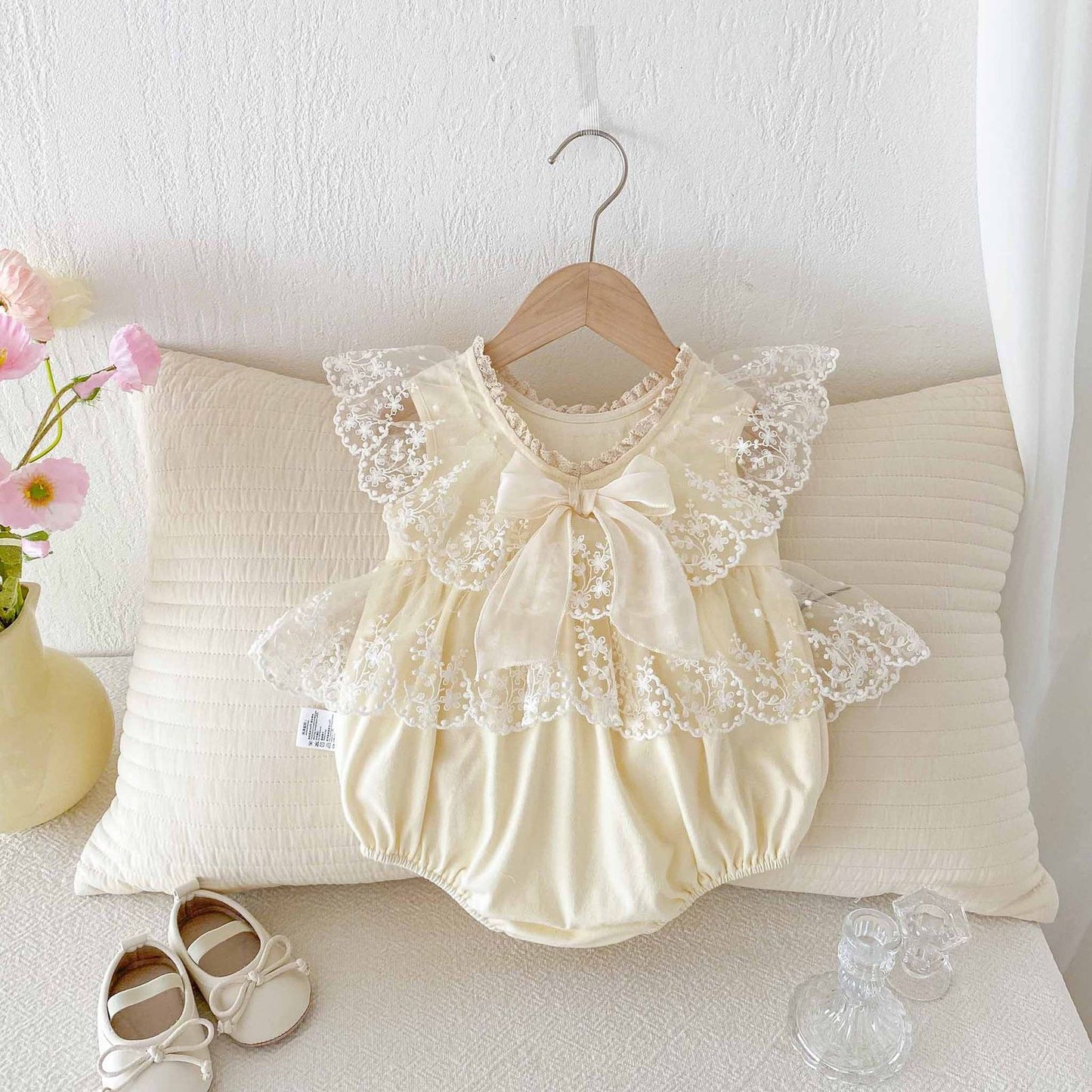 Beige baby romper dress with lace collar and bow knot