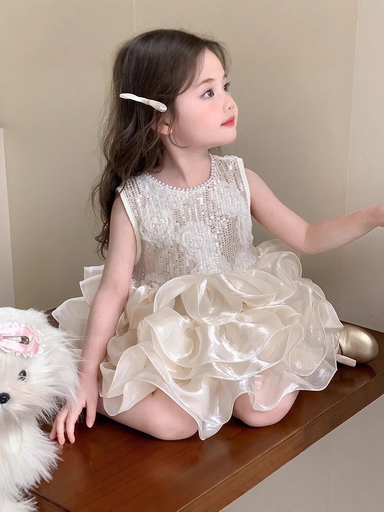 beige multi-layered princess dress with removable big bow at back