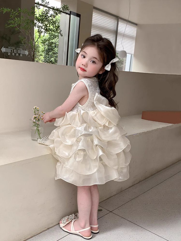 beige multi-layered princess dress with removable big bow at back
