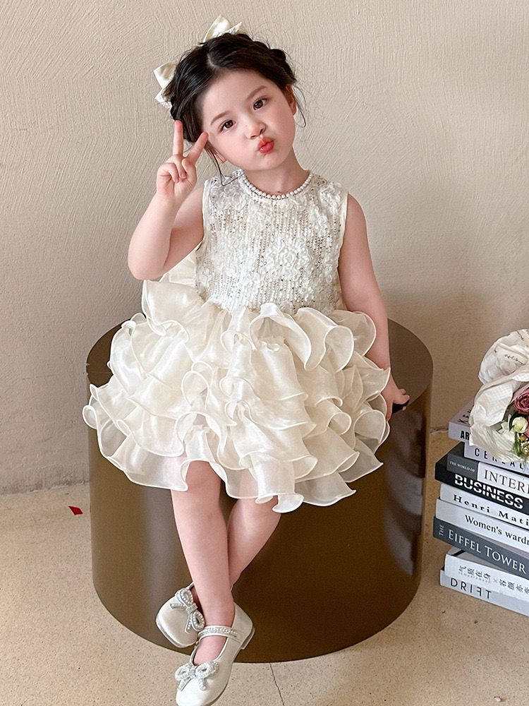 beige multi-layered princess dress with removable big bow at back