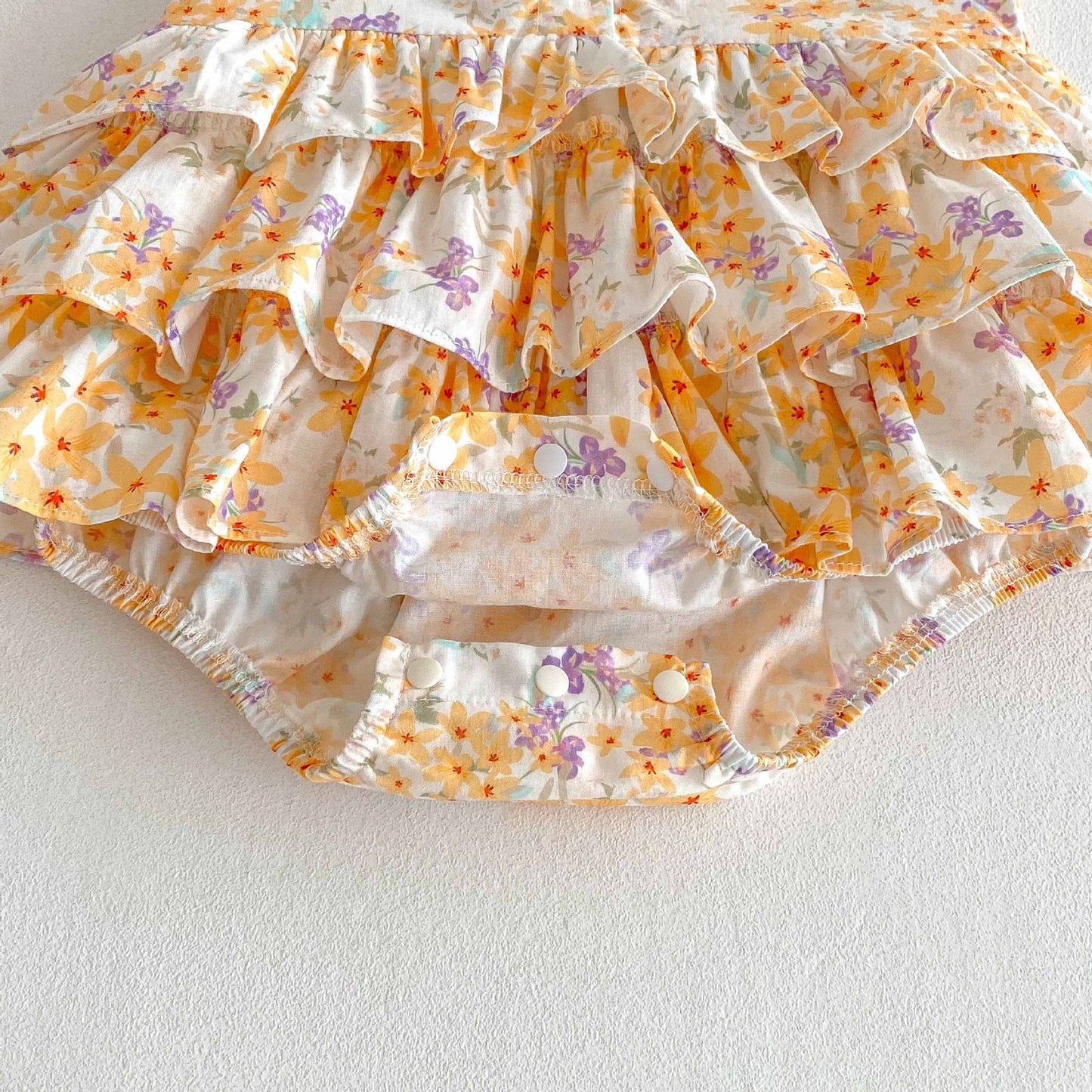 Baby collared floral romper dress with layered ruffles