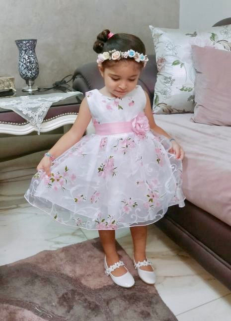 Girl white dress with pink flowers