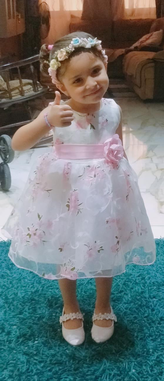 Girl white dress with pink flowers