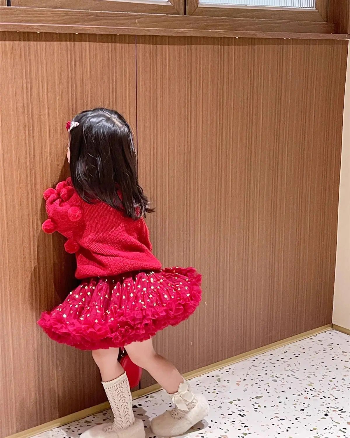 Cute red sweater with Pom poms