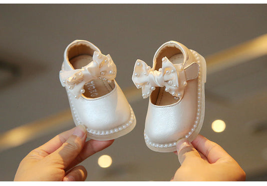 Beige leather shoes with bow knot