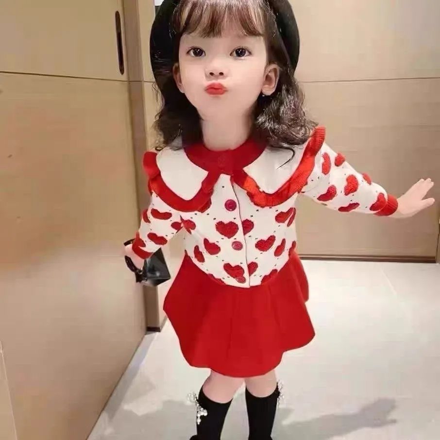 Set of 2pcs knitted jacket + skirt .