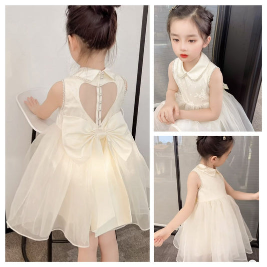 Party dress with see through back and heart shape, with  big bow knot at back and pearls beige color