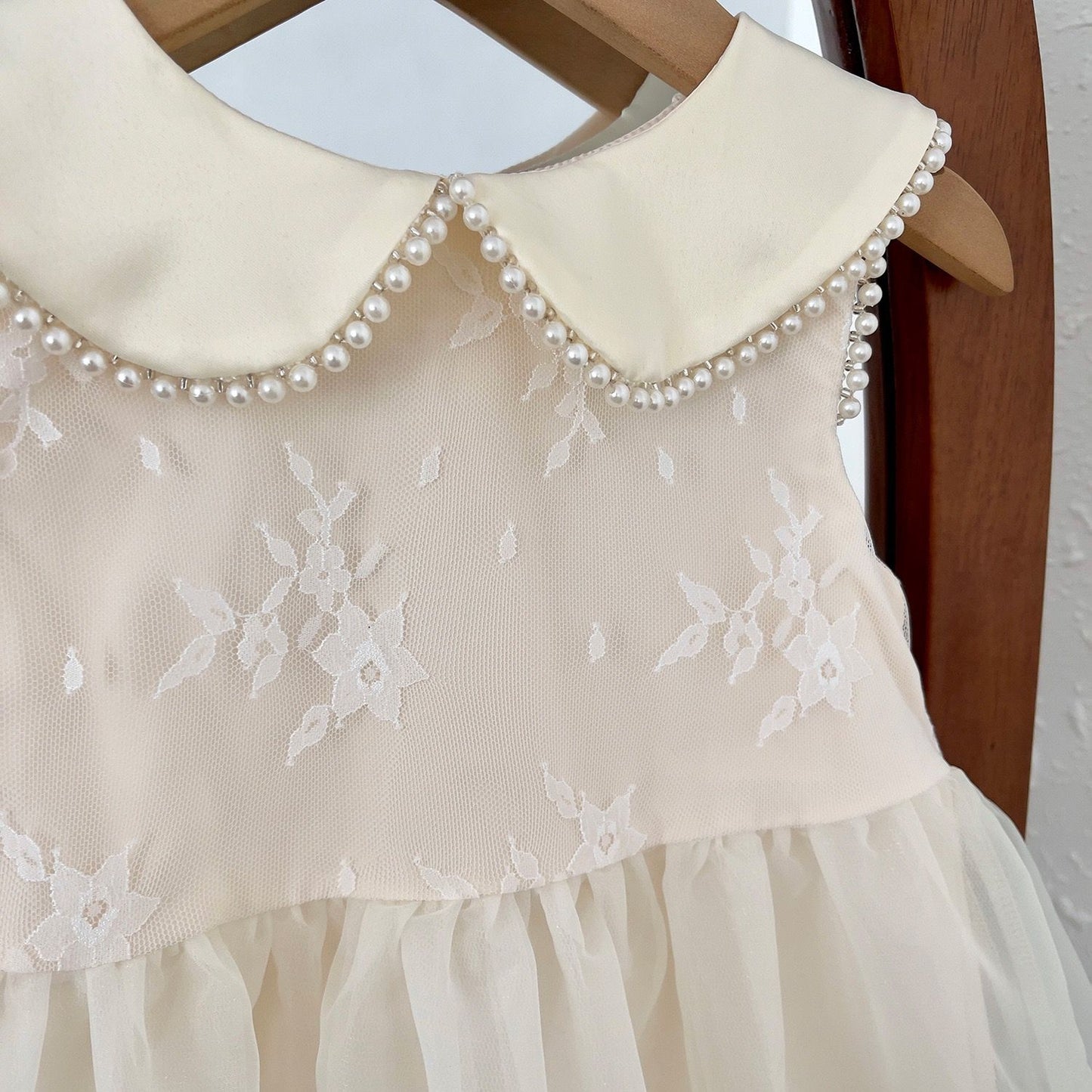 Party dress with see through back and heart shape, with  big bow knot at back and pearls beige color