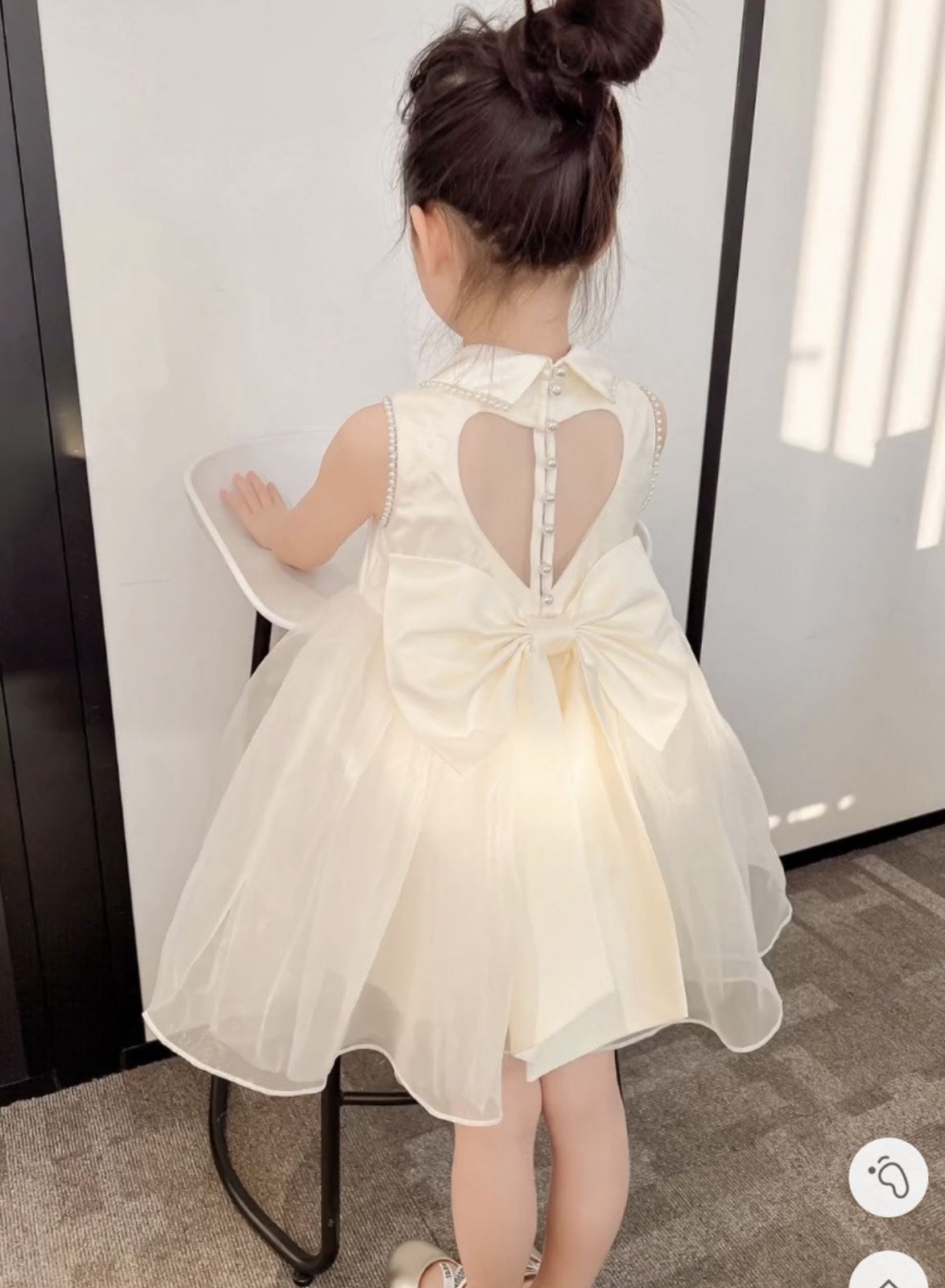 Party dress with see through back and heart shape, with  big bow knot at back and pearls beige color