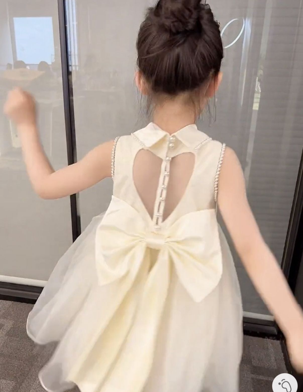 Party dress with see through back and heart shape, with  big bow knot at back and pearls beige color