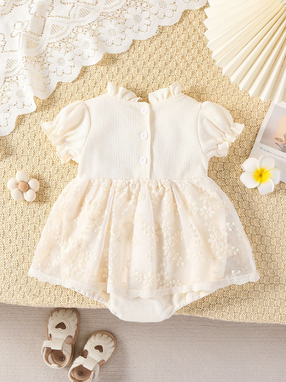 Short sleeve romper dress with 2 bow knots beige color